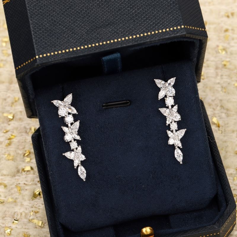 T*f*ny earrings